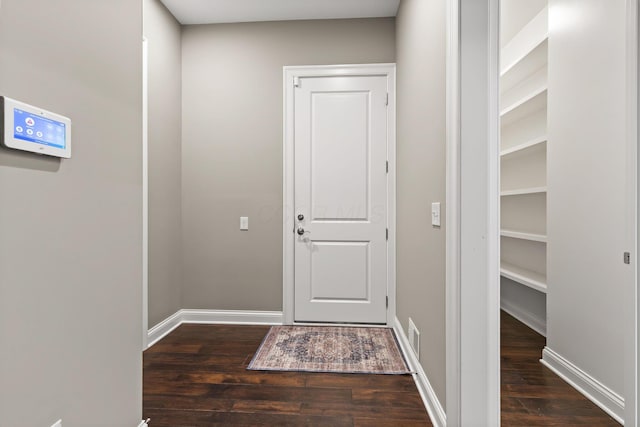 1462 Dogwood Loop, Powell, OH 43065 - entryway featuring visible vents, baseboards, and wood finished floors