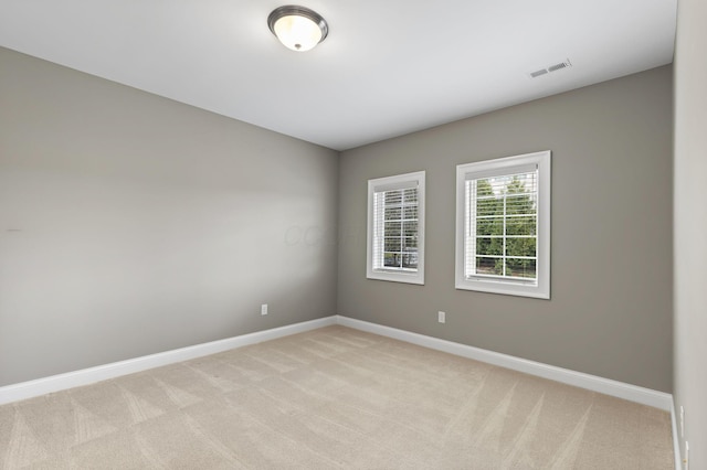 1462 Dogwood Loop, Powell, OH 43065 - unfurnished room featuring baseboards, visible vents, and light colored carpet