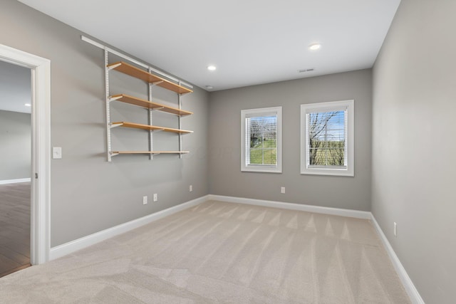 1462 Dogwood Loop, Powell, OH 43065 - spare room with baseboards, visible vents, recessed lighting, and light carpet