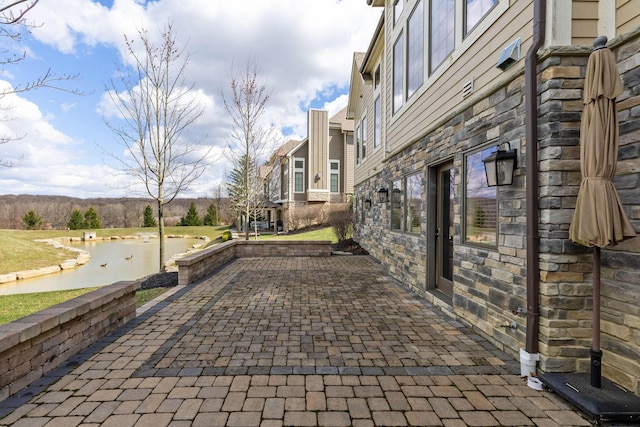 1462 Dogwood Loop, Powell, OH 43065 - view of patio featuring a water view