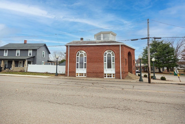 108 W Main St, Glenford, OH 43739 - view of front of home featuring fence and brick siding