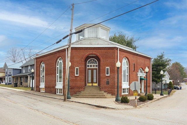 108 W Main St, Glenford, OH 43739 - view of front facade with french doors and brick siding