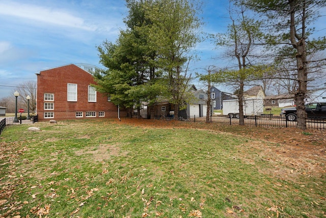 108 W Main St, Glenford, OH 43739 - view of yard with a garage and fence