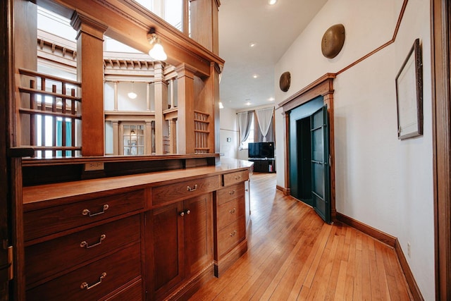 108 W Main St, Glenford, OH 43739 - kitchen with baseboards, light wood-style flooring, recessed lighting, light countertops, and open floor plan