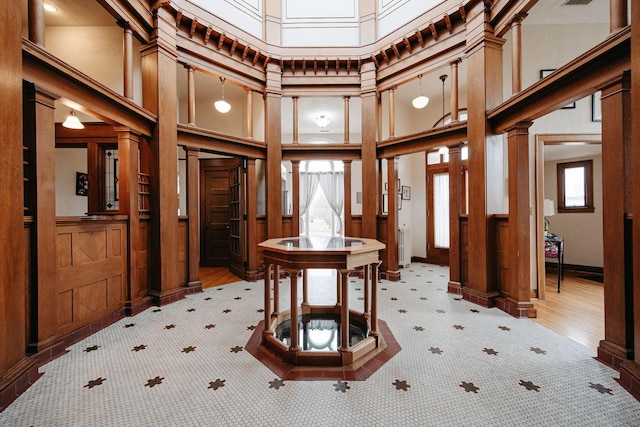 108 W Main St, Glenford, OH 43739 - foyer with visible vents, a high ceiling, and a decorative wall