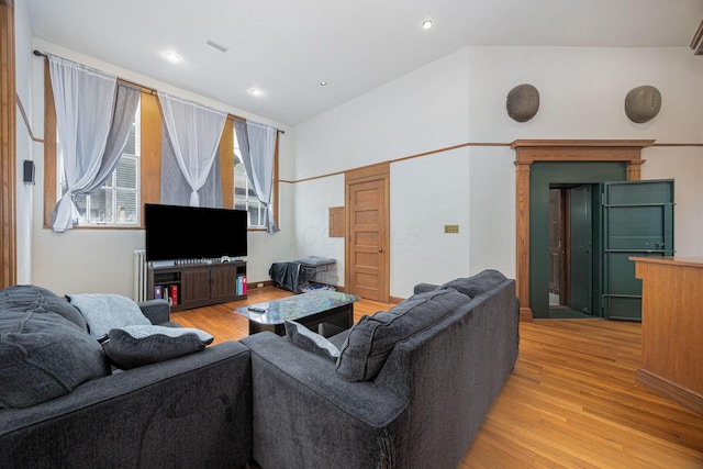 108 W Main St, Glenford, OH 43739 - living room featuring light wood finished floors, visible vents, recessed lighting, and lofted ceiling