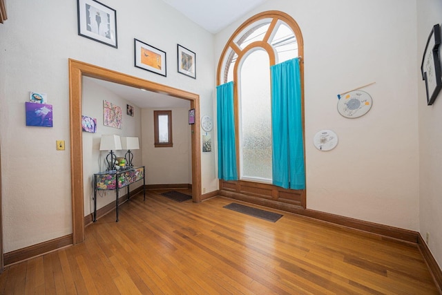 108 W Main St, Glenford, OH 43739 - entryway with visible vents, baseboards, and hardwood / wood-style floors
