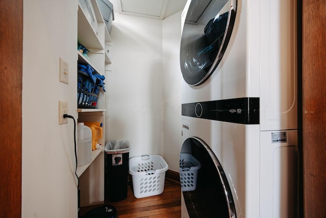 108 W Main St, Glenford, OH 43739 - clothes washing area with laundry area, stacked washer and dryer, and wood finished floors