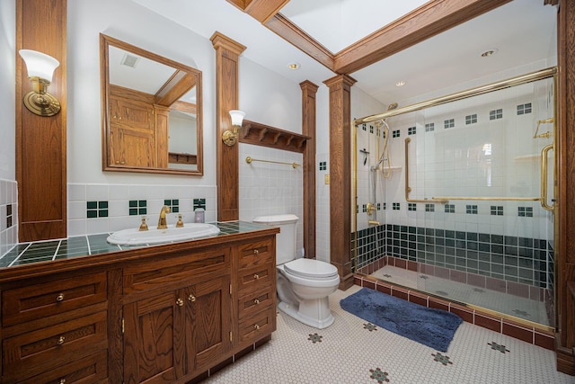 108 W Main St, Glenford, OH 43739 - full bath with toilet, tile walls, a stall shower, and ornate columns