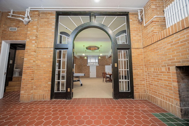 108 W Main St, Glenford, OH 43739 - doorway to property featuring a patio area and visible vents