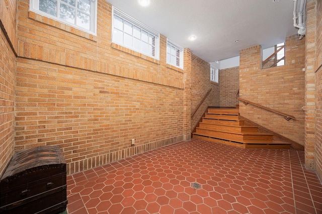 108 W Main St, Glenford, OH 43739 - basement featuring stairway and brick wall