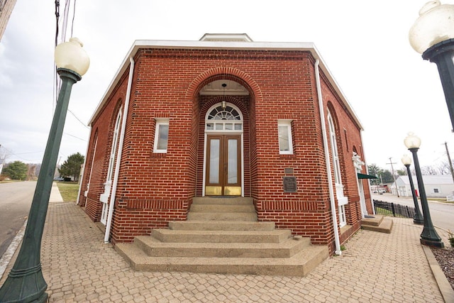 108 W Main St, Glenford, OH 43739 - doorway to property with french doors and brick siding