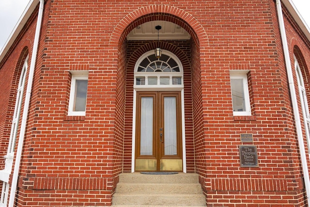 108 W Main St, Glenford, OH 43739 - property entrance featuring brick siding