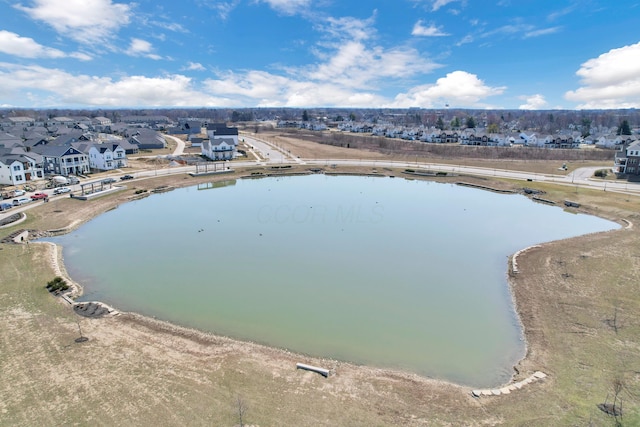 aerial view featuring a residential view and a water view