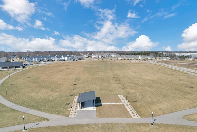 birds eye view of property with a residential view