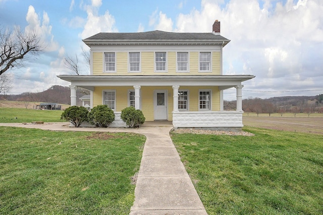 19643 Big Pine Rd, Laurelville, OH 43135 - view of front of property featuring covered porch, a chimney, and a front lawn