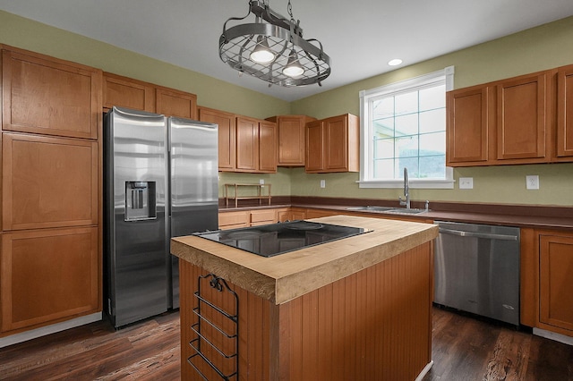 19643 Big Pine Rd, Laurelville, OH 43135 - kitchen with a kitchen island, dark wood finished floors, a sink, appliances with stainless steel finishes, and butcher block counters