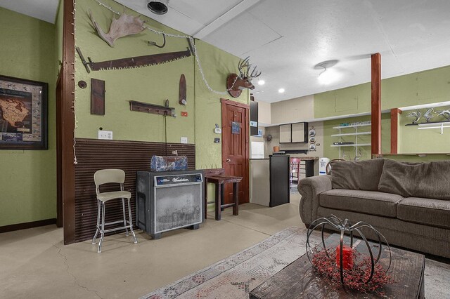 19643 Big Pine Rd, Laurelville, OH 43135 - living area with finished concrete flooring