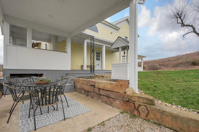 19643 Big Pine Rd, Laurelville, OH 43135 - view of patio / terrace featuring covered porch and outdoor dining space