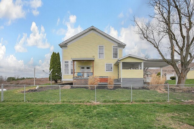 19643 Big Pine Rd, Laurelville, OH 43135 - back of property with a fenced backyard, an attached carport, and a yard