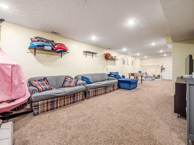 living area featuring recessed lighting, carpet, visible vents, and a textured ceiling