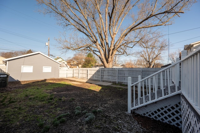 view of yard with a fenced backyard