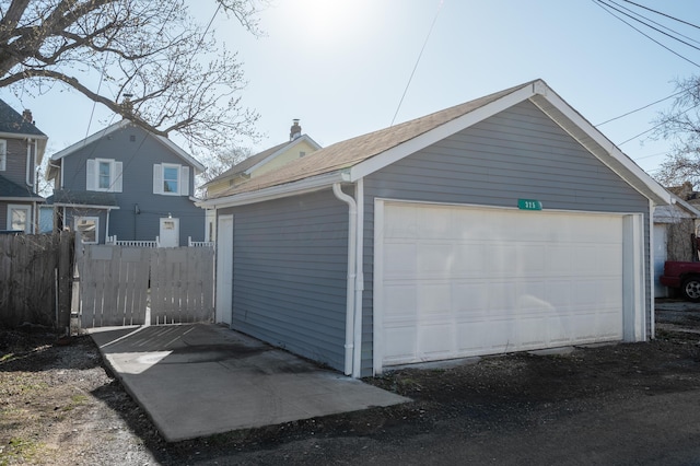 detached garage with fence