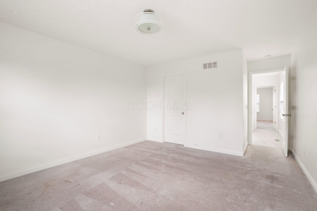 5388 Middlebury Lp, Lewis Center, OH 43035 - spare room featuring visible vents, light colored carpet, and baseboards