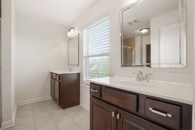 5388 Middlebury Lp, Lewis Center, OH 43035 - bathroom with a sink, two vanities, and plenty of natural light