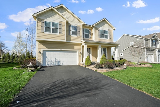 5388 Middlebury Lp, Lewis Center, OH 43035 - craftsman house with driveway, an attached garage, and a front lawn