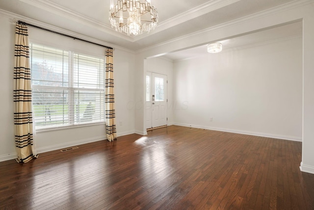 5388 Middlebury Lp, Lewis Center, OH 43035 - unfurnished room with hardwood / wood-style floors, an inviting chandelier, crown molding, and visible vents