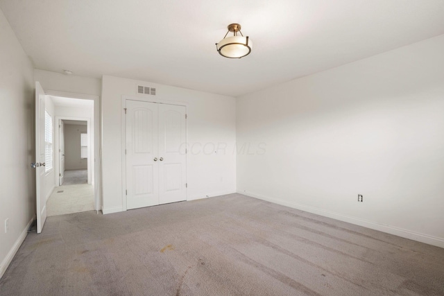 5388 Middlebury Lp, Lewis Center, OH 43035 - unfurnished bedroom featuring a closet, visible vents, baseboards, and carpet floors