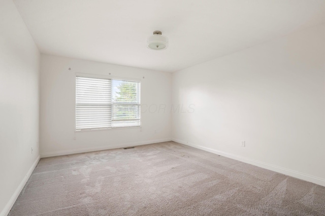 5388 Middlebury Lp, Lewis Center, OH 43035 - spare room featuring light colored carpet and baseboards
