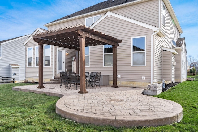 rear view of property with a patio, a yard, a pergola, and entry steps