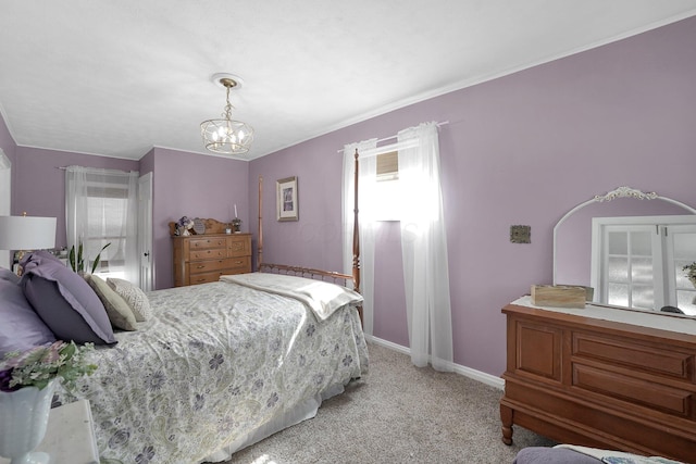 28 John St, Mount Sterling, OH 43143 - bedroom with light colored carpet, a chandelier, and multiple windows