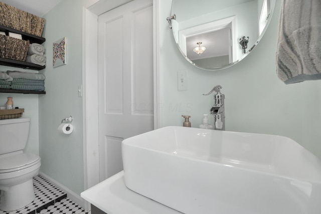28 John St, Mount Sterling, OH 43143 - bathroom featuring a sink and toilet