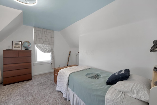 28 John St, Mount Sterling, OH 43143 - carpeted bedroom with vaulted ceiling and baseboards