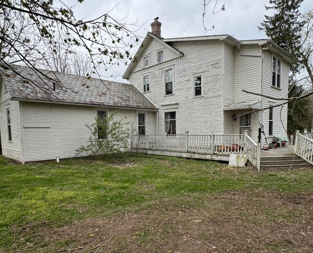 4175 Reynoldsburg Baltimore Rd NW, Baltimore, OH 43105 - back of house with a lawn, a chimney, and a deck