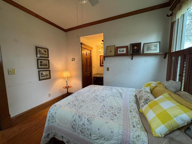 4175 Reynoldsburg Baltimore Rd NW, Baltimore, OH 43105 - bedroom featuring a ceiling fan, baseboards, ornamental molding, and wood finished floors