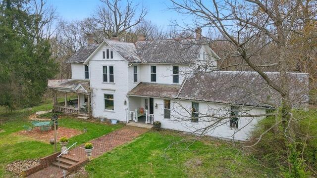 4175 Reynoldsburg Baltimore Rd NW, Baltimore, OH 43105 - traditional-style home with a porch, a chimney, and a front yard