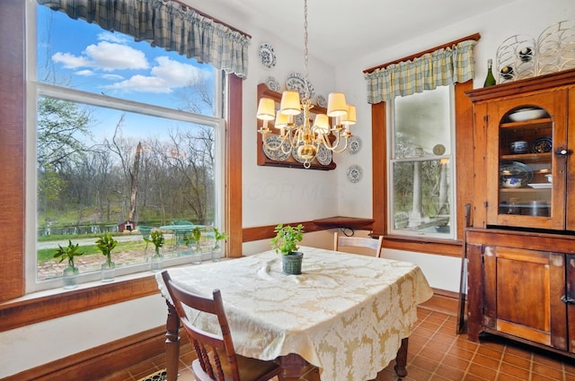 4175 Reynoldsburg Baltimore Rd NW, Baltimore, OH 43105 - dining room featuring a chandelier and dark tile patterned flooring