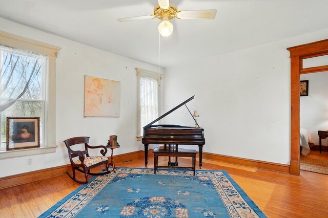 4175 Reynoldsburg Baltimore Rd NW, Baltimore, OH 43105 - living area featuring baseboards, a ceiling fan, and wood finished floors