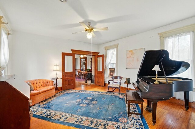 4175 Reynoldsburg Baltimore Rd NW, Baltimore, OH 43105 - living area with wood-type flooring, baseboards, and a ceiling fan