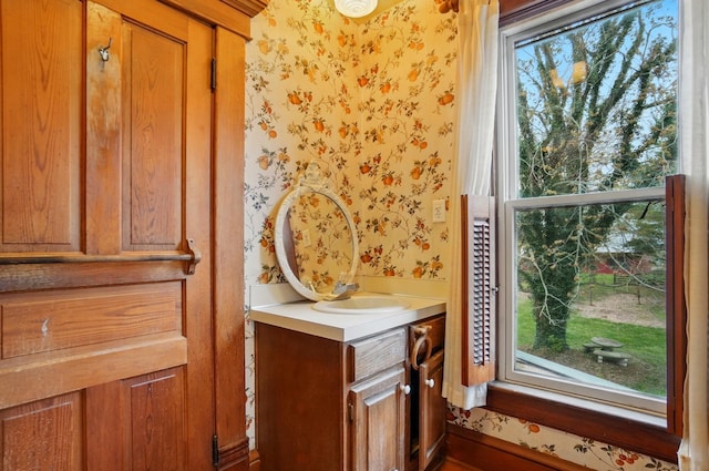 4175 Reynoldsburg Baltimore Rd NW, Baltimore, OH 43105 - bathroom with wallpapered walls and vanity
