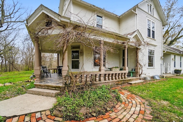 4175 Reynoldsburg Baltimore Rd NW, Baltimore, OH 43105 - victorian-style house featuring a front lawn and covered porch
