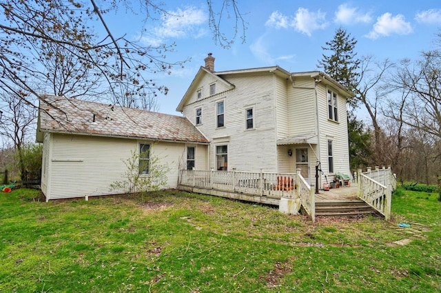 4175 Reynoldsburg Baltimore Rd NW, Baltimore, OH 43105 - rear view of house with a wooden deck, a chimney, and a yard