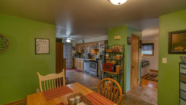 dining area with a ceiling fan