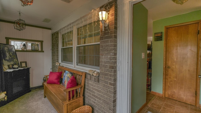 interior space featuring visible vents and covered porch