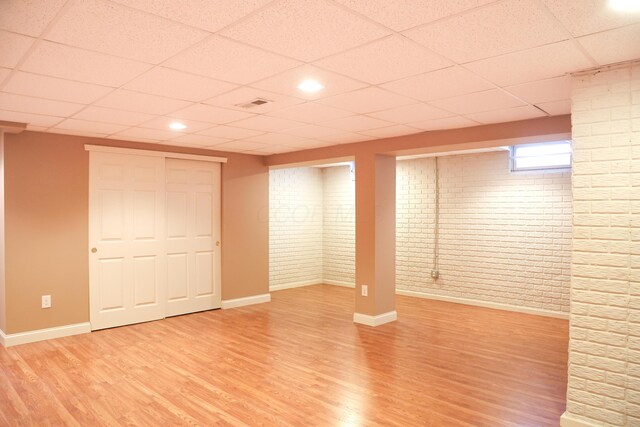 7720 Marrisey Loop, Galena, OH 43021 - below grade area with light wood-style floors, baseboards, a paneled ceiling, and recessed lighting