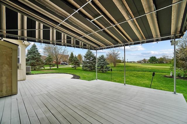 wooden terrace featuring a lawn and golf course view